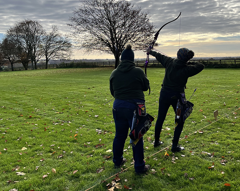 An archer aiming to shoot